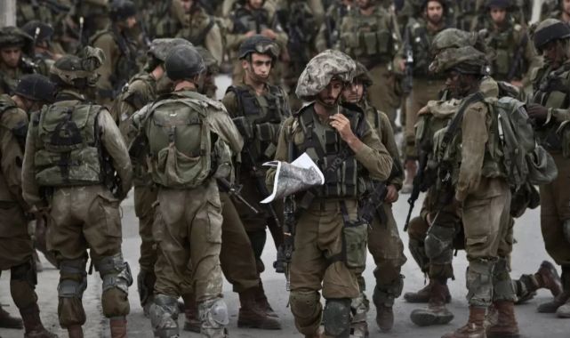 Filistin topraklarını gasbeden İsrailli bir grup kendi askerlerine saldırdı